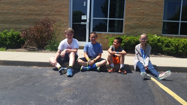 These four kids have 13 years of experience at Trinity's SACC between them. 